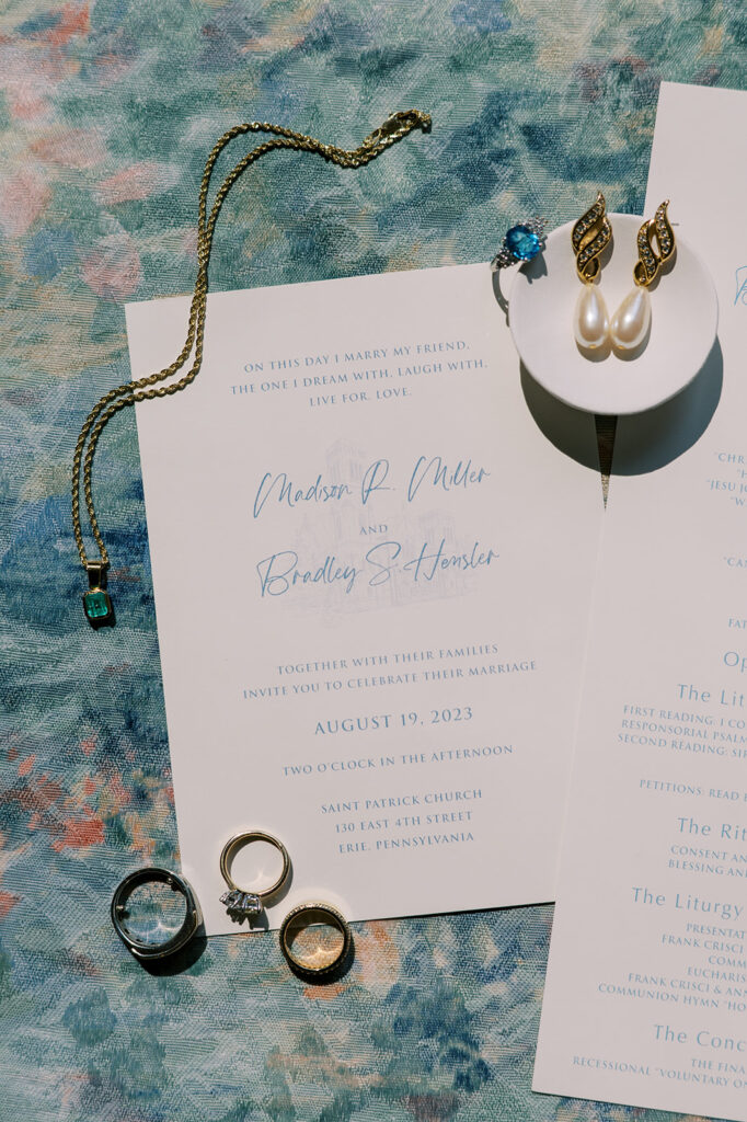 Wedding detail shot of an invitation to wedding reception erie pa