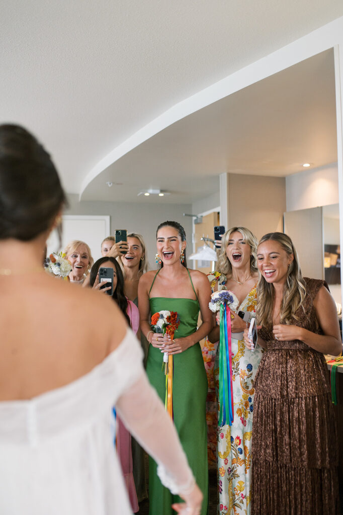 Bridal party reacts to seeing an Erie, PA bride on her wedding day