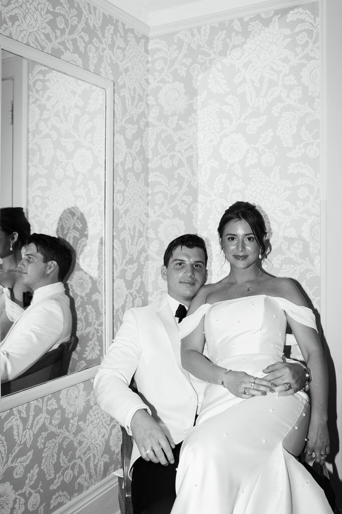 An Erie, PA bride and her groom are seated inside Kahkwa Club